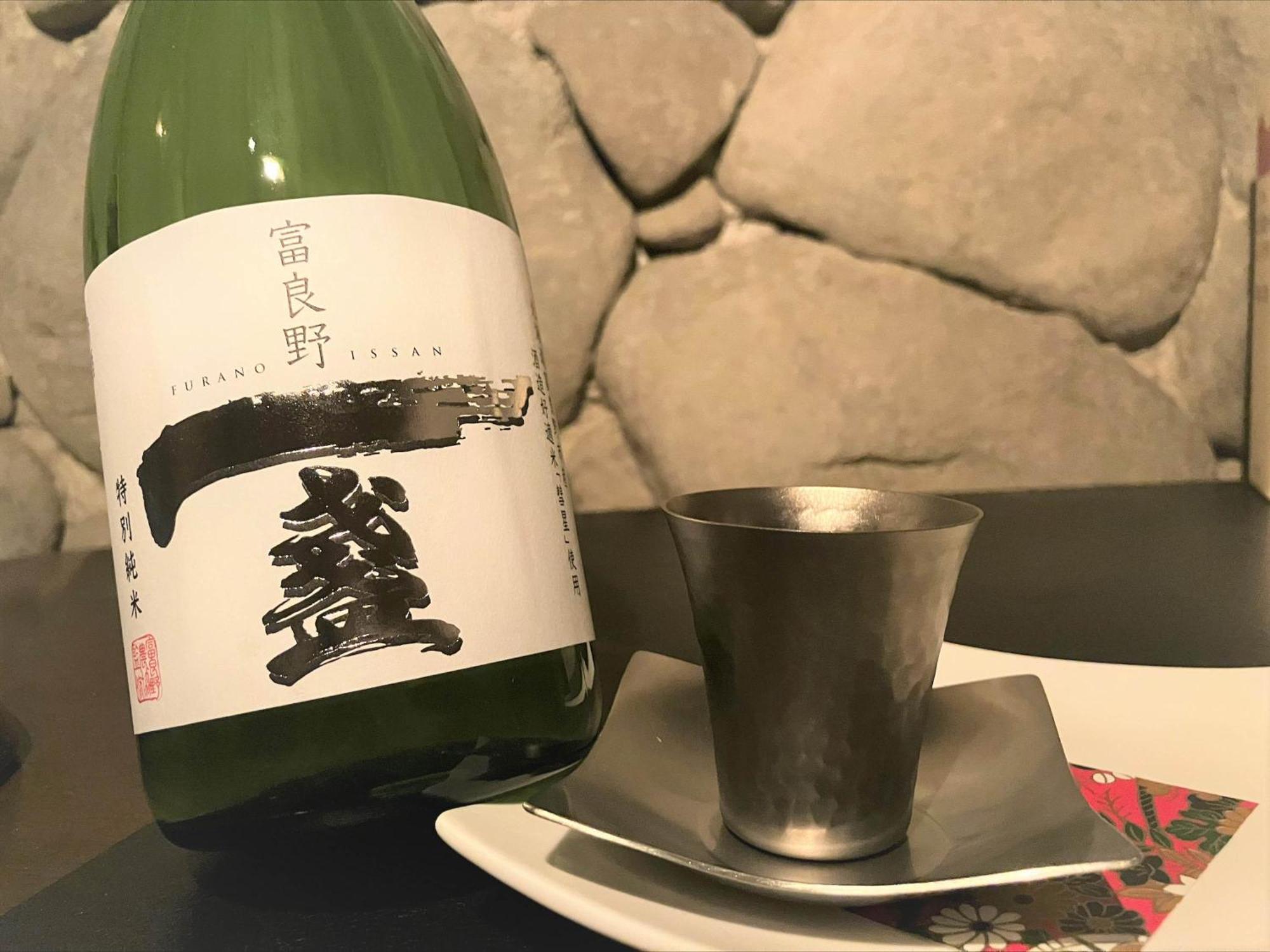 Shin Furano Prince Hotel Buitenkant foto A bottle of sake