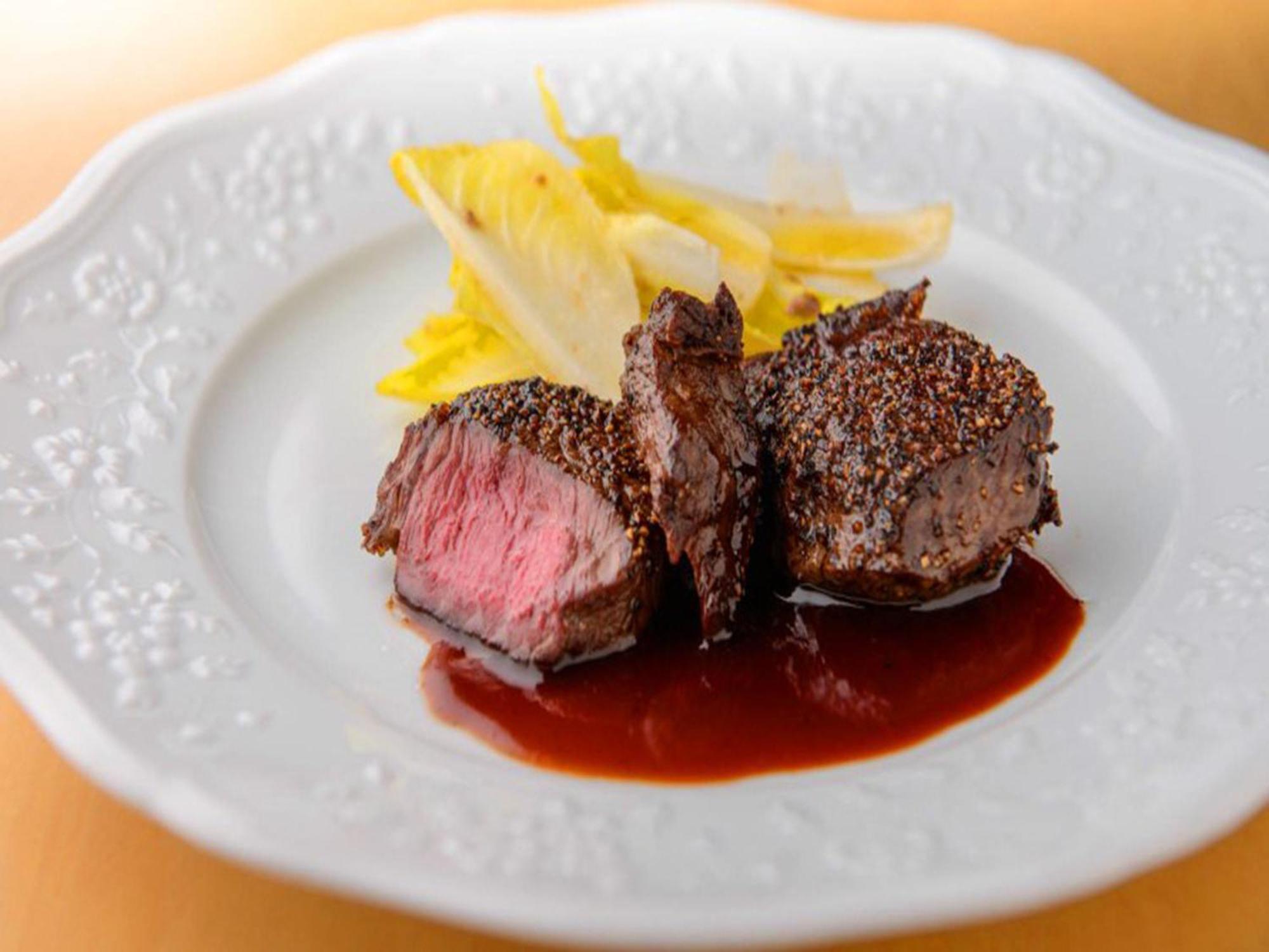 Shin Furano Prince Hotel Buitenkant foto A steak prepared using the dry-aging technique